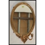 A 19th century Victorian oval gilt plaster wall /