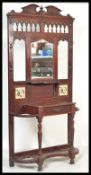 A 19th Century Victorian hall stand having a centr