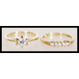 Two hallmarked 9ct gold rings to include a ring pr