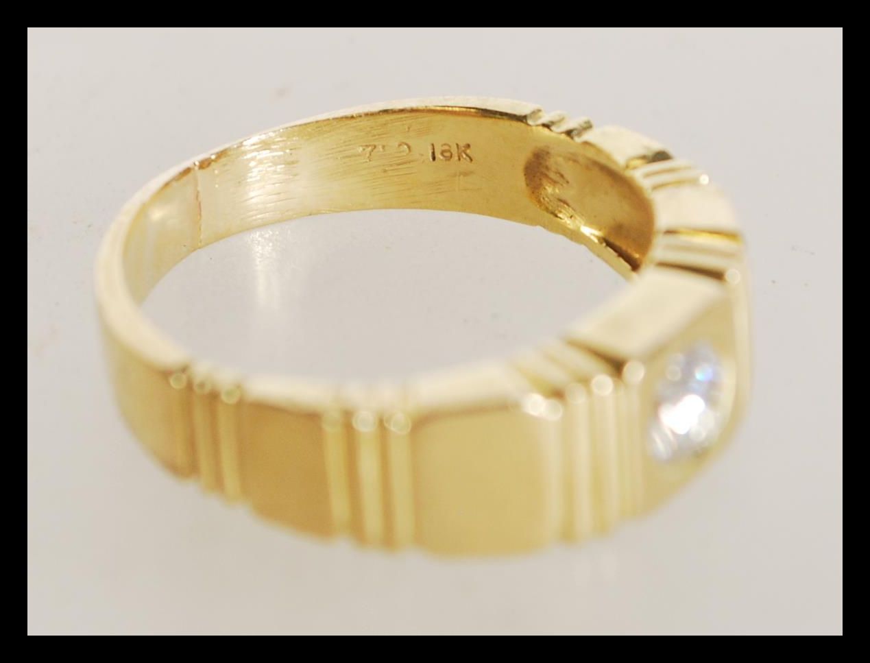 An 18ct gold diamond band ring having an inset dia - Image 4 of 4