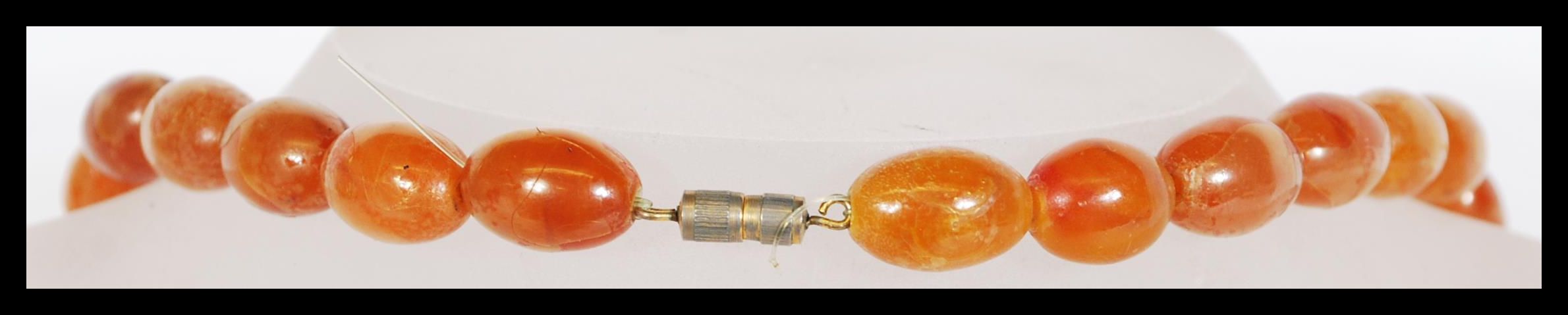 A vintage amber / faux amber Chinese prayer bead n - Image 4 of 4