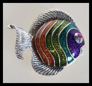 A sterling silver plique a jour brooch in the form