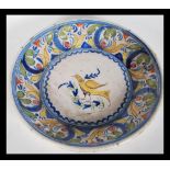 An 18th Century Delft polychrome charger plate dep