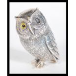 A sterling silver novelty miniature figurine of an