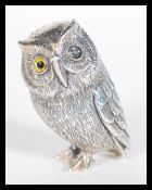 A sterling silver novelty miniature figurine of an