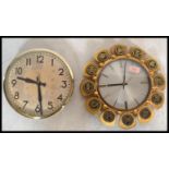 Two vintage retro 20th Century wall clocks compris