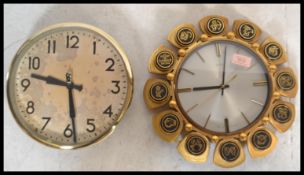Two vintage retro 20th Century wall clocks compris