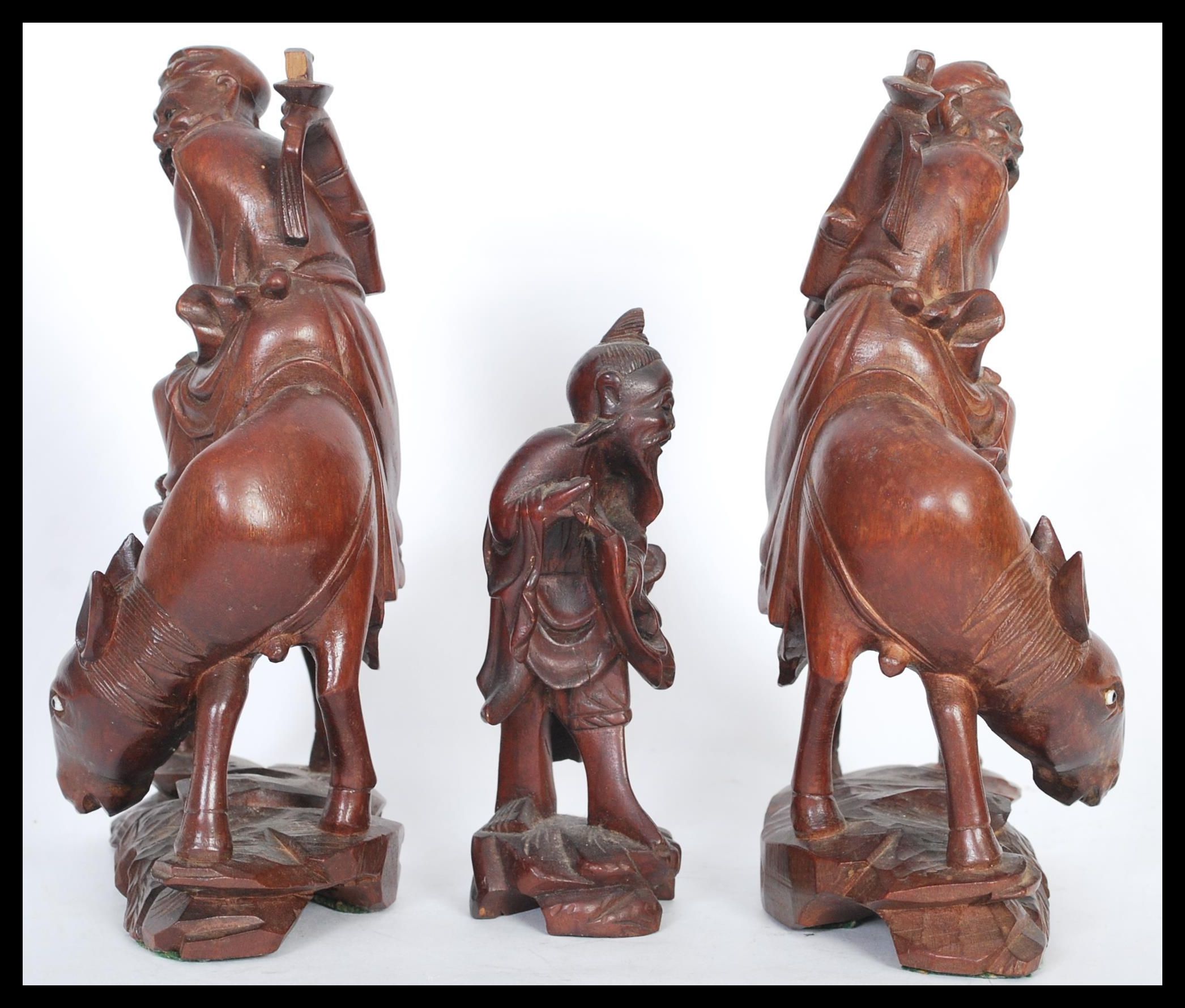 A pair of 20th Century Chinese carved figurines of - Image 2 of 4