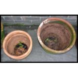 A collection of vintage terracotta stone garden pl