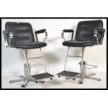 A pair of retro style contemporary barbers / salon