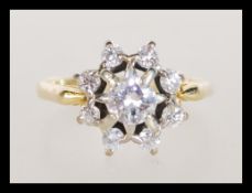 An 18ct gold 1.3 carat diamond cluster ring having