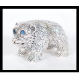 A sterling silver novelty miniature figurine of an