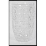 A large bulbous cut glass lead crystal vase dating