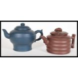 Two Chinese Yixing terracotta teapots comprising o