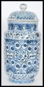 A Chinese hand painted blue and white ceramic vase