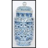 A Chinese hand painted blue and white ceramic vase