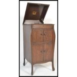 A vintage early 20th Century Edwardian HMV mahogany gramophone cabinet, side winding with sound
