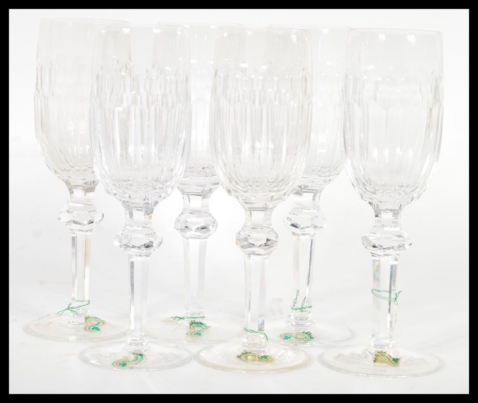 A set of 6 Irish Waterford crystal wine glasses. Facet cut stems with deep bowls all having the