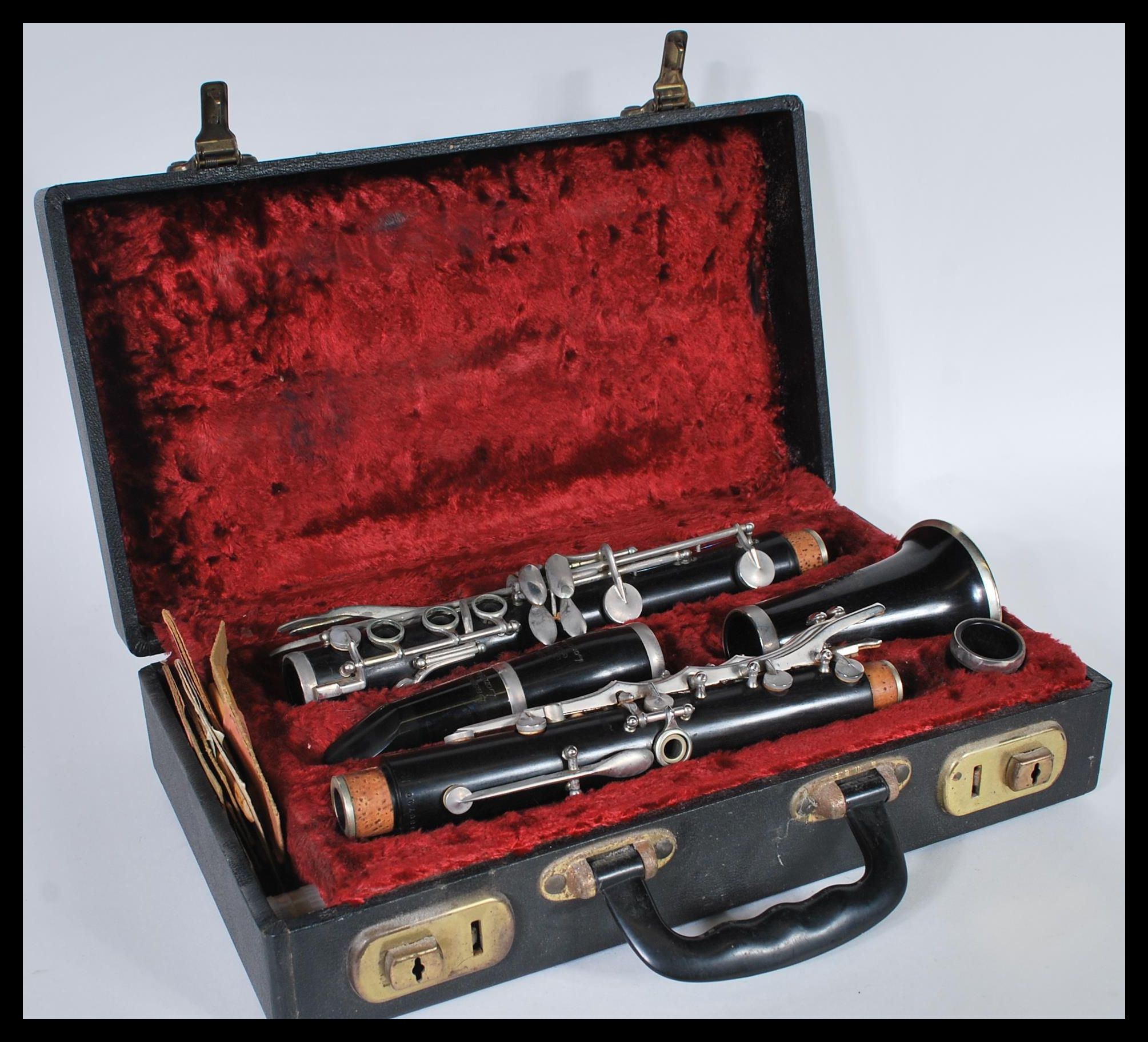 An Academy Besson & Co rosewood clarinet complete in a fitted leather carry case, with a selection - Image 6 of 6