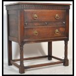 An Edwardian oak Jacobean revival chest of drawers