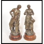 After Ruffony French Sculptor - A pair of early 20th Century bronze spelter figurines depicting