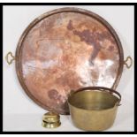 A 19th Century large copper pan tray with riveted brass handles along with a brass jam preserve