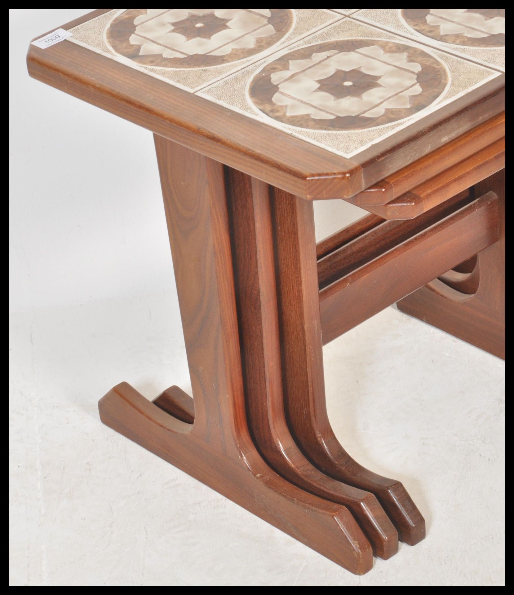 A retro 20th Century teak wood tile top nest of graduating tables, the graduating tables raised on L - Image 3 of 6