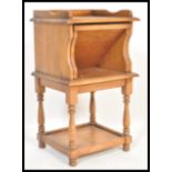 An unusual Victorian style oak whatnot / etagere 3 tier hall table stand with fold down reading