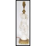 A 19th century Victorian table lamp centerpiece  having a white glazed nude figurine in classical