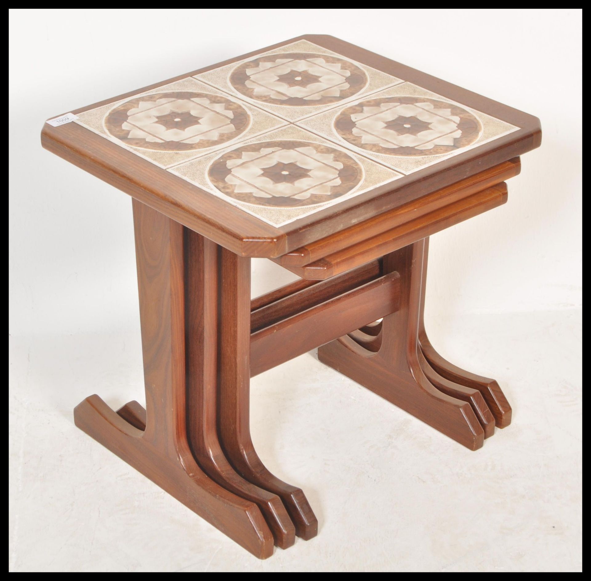 A retro 20th Century teak wood tile top nest of graduating tables, the graduating tables raised on L - Image 2 of 6
