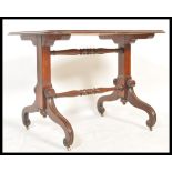 A fantastic 19th Century William IV mahogany table raised on scrolled leg with brass castors. Two