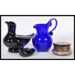 A group of blue glassware to include a signed Bristol Blue large paperweight in the form of a