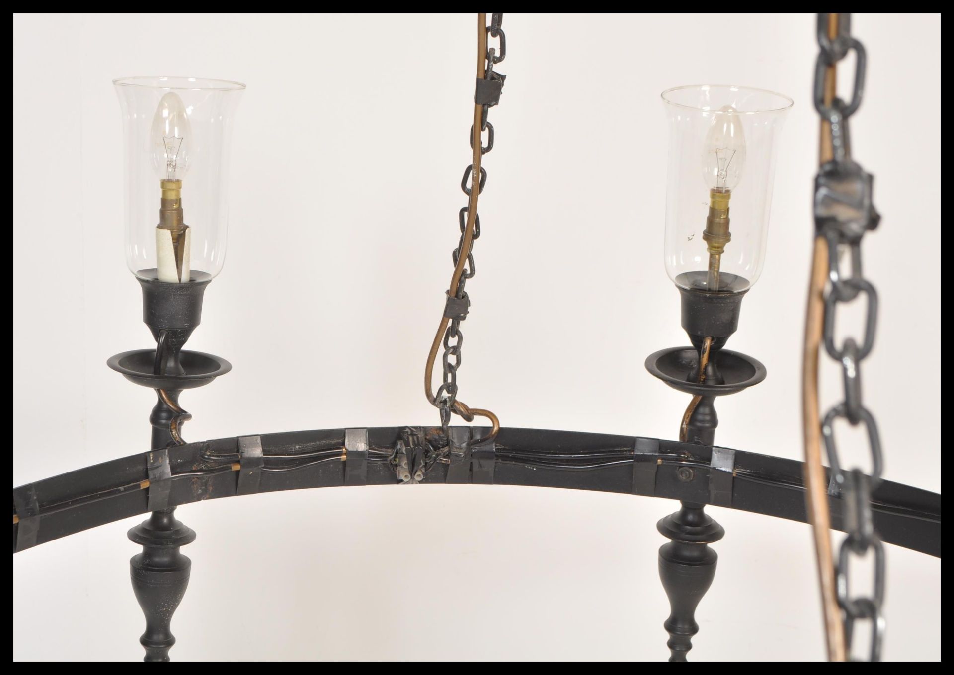 A large 20th Century ebonised iron ceiling light chandelier having eight ebonised sconces with - Bild 4 aus 7