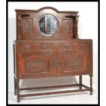 An early 20th century Edwardian mahogany mirror back sideboard, central oval bevel edged mirror