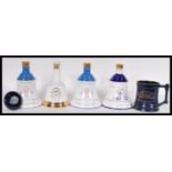 A selection of vintage commemorative Bell's Whisky two decanters to include the Queen Mother's
