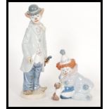 Two vintage Lladro ceramic figurines depicting clowns to include a clown with violin 5472 and