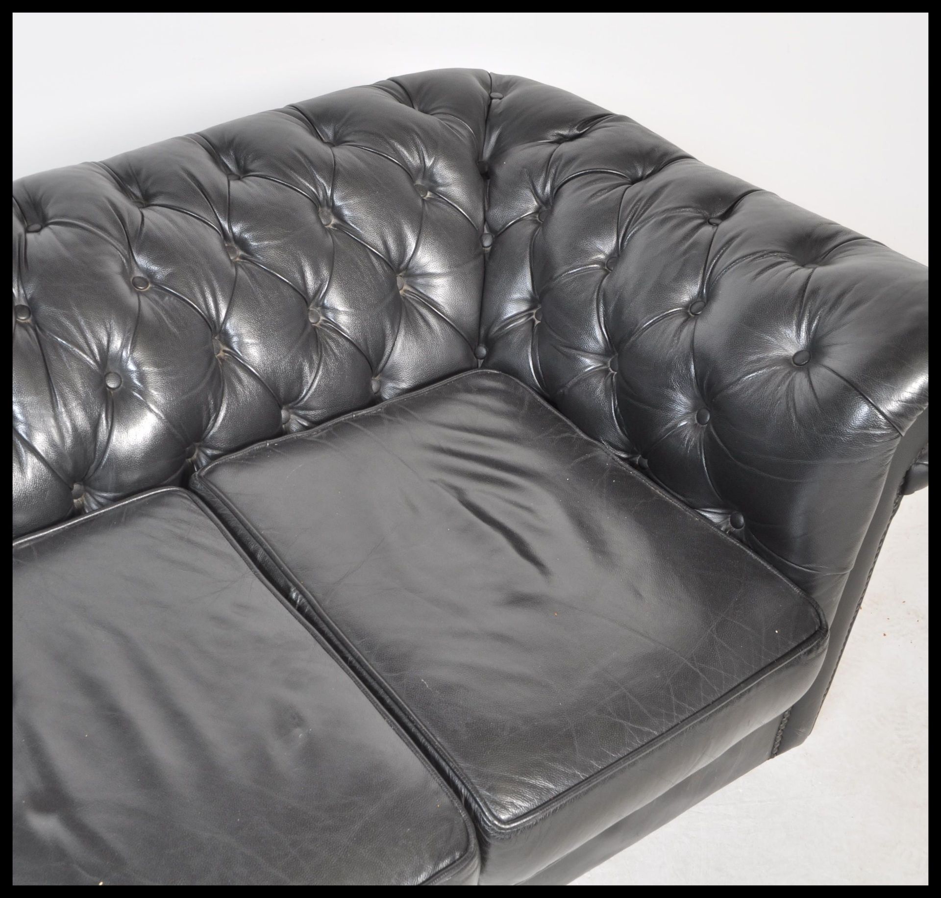 A contemporary black leather button back three seater Chesterfield sofa with button back and - Image 4 of 5