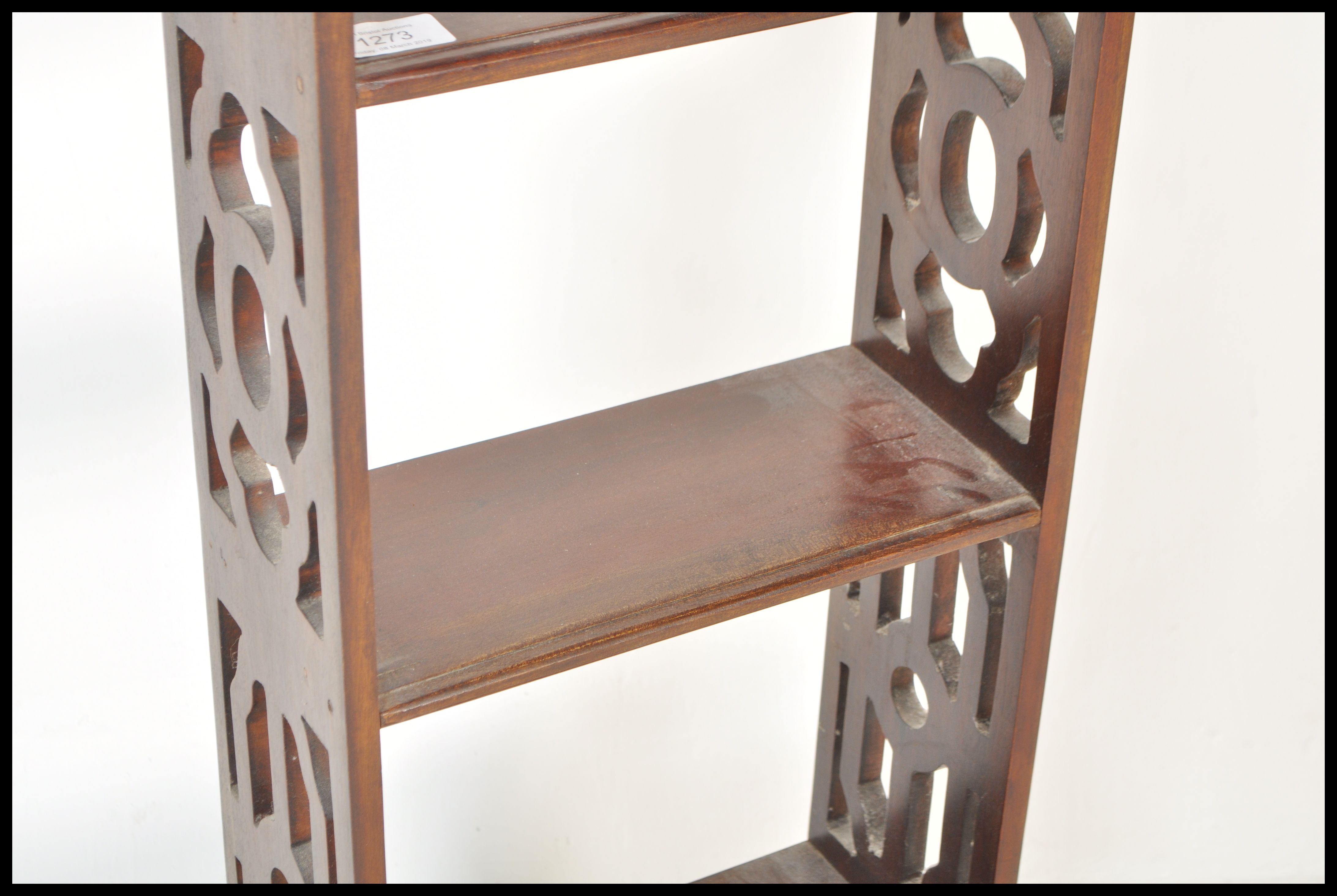 A 19th Century Victorian mahogany whatnot bookcase having a set of four shelves over twin drawer - Image 4 of 7