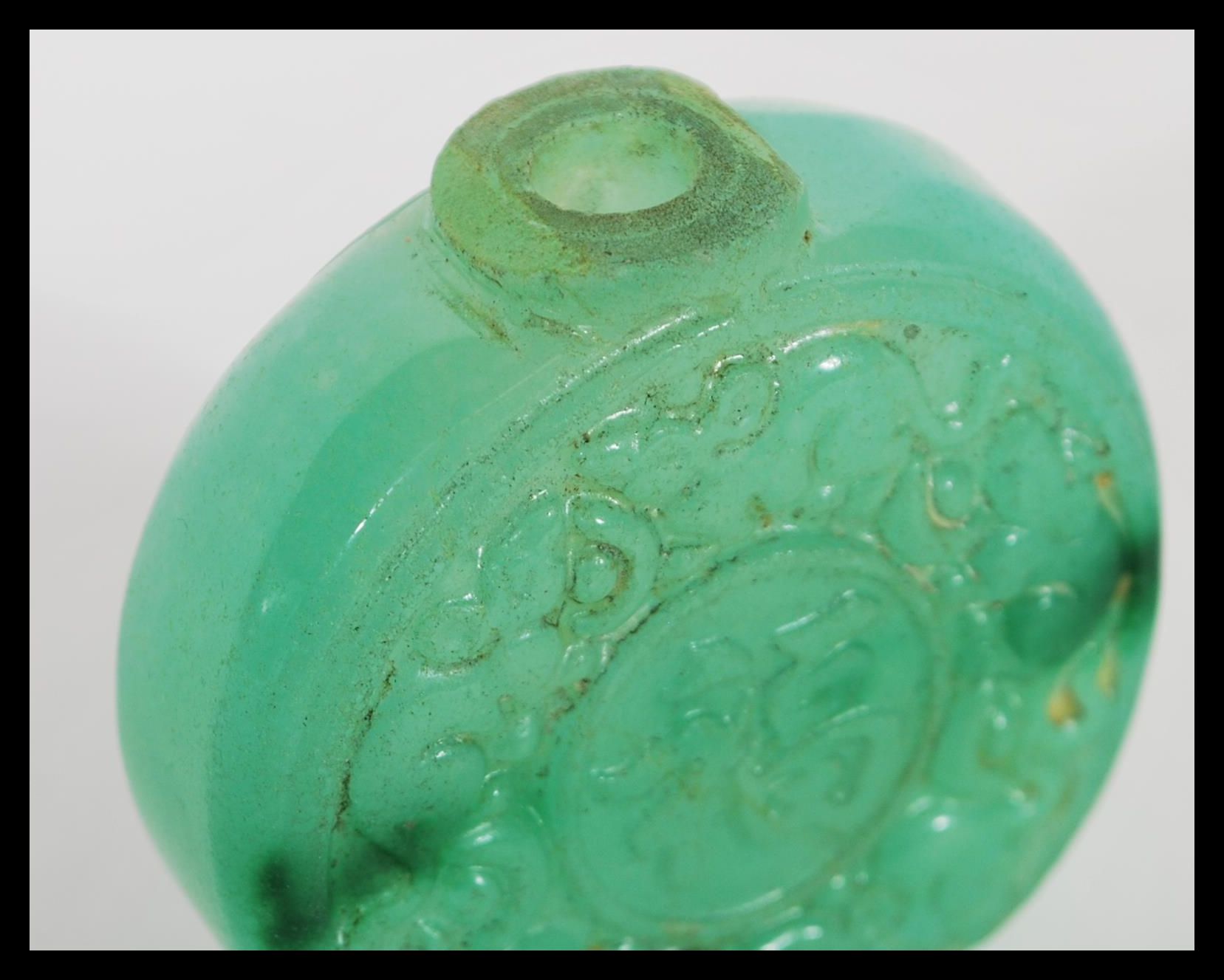 A 19th Century Chinese Jade bi disc snuff or perfume bottle of circular form with character marks - Image 2 of 5