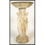A 20th Century cast concrete composite weathered garden stoneware fountain in the form of the