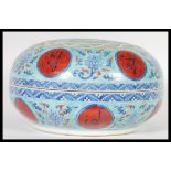 A 20th Century Chinese large serving tureen of circular form having hand painted decoration with