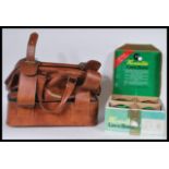 Two sets of vintage Lawn Bowls, one set within the original box and the other in a sports bag with