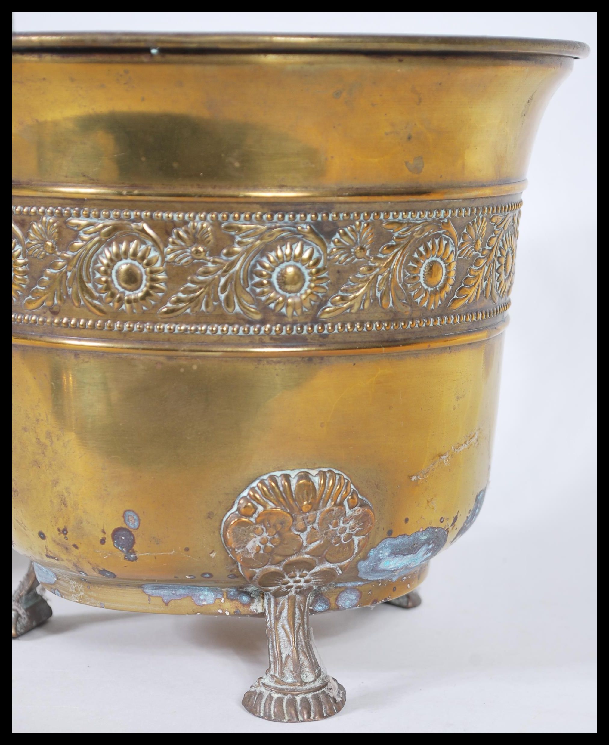 An early 20th Century Anglo Indian brass planter decorated in  relief together with another - Image 4 of 6