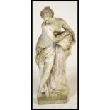 A 20th Century cast concrete composite weathered garden stoneware figurine in the form of a
