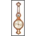 A 19th century Georgian mahogany barometer having a silvered dial with convex mirror glass,