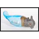 A 19th Century French Depose perfume bottle in the form of a bird having a opaque blue glass body