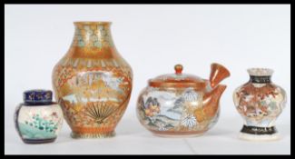 A group of early 20th Century Oriental Japanese satsuma ware ceramics to include vase, teapot,