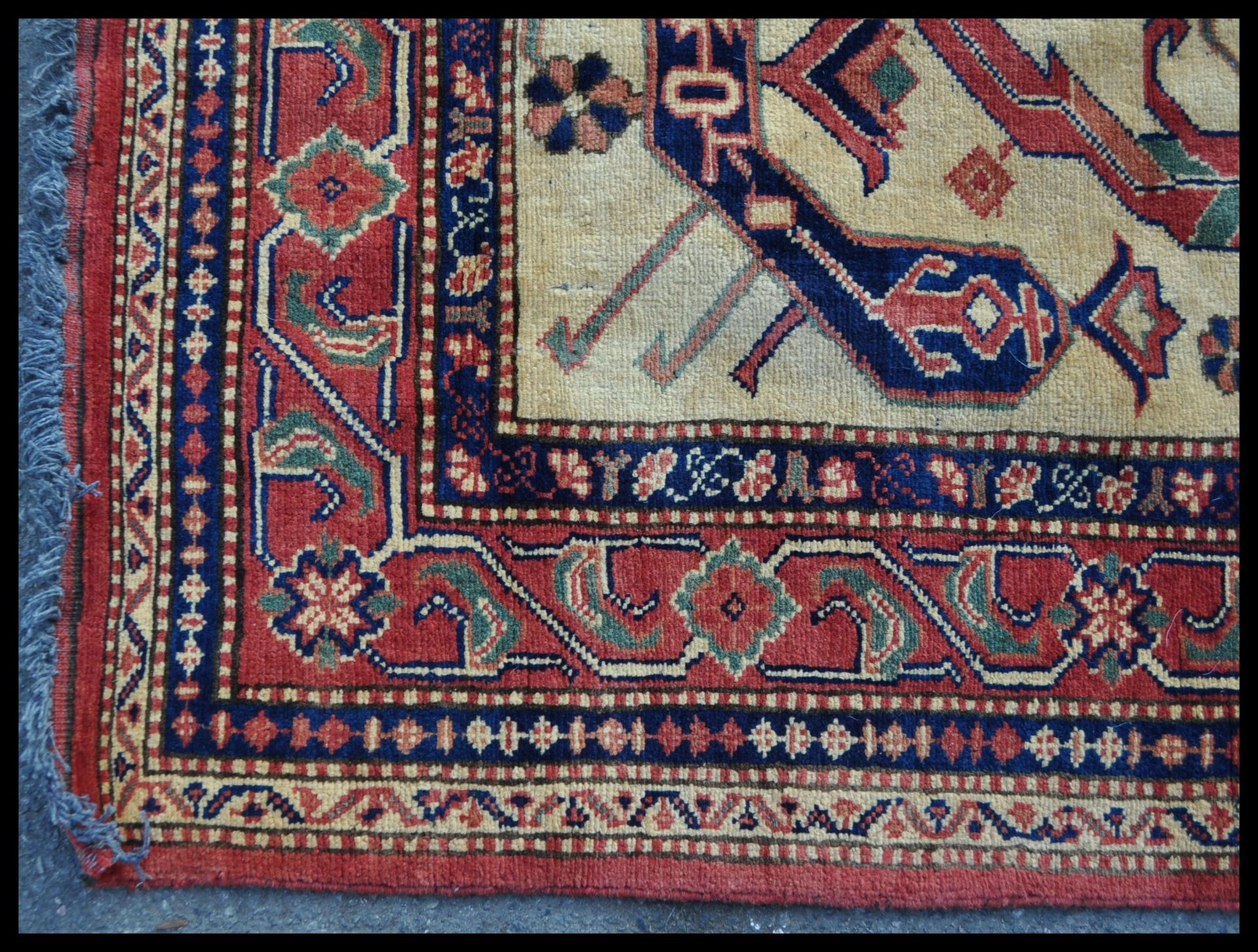 A 20th Century hand knotted Afghan carpet rug having a red ground with a central yellow panel with - Bild 3 aus 4