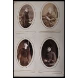 Two early 20th Century Edwardian photograph albums containing to include several family portrait