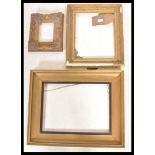 A collection of gilt picture frames to include a 19th century Victorian wooden picture frame